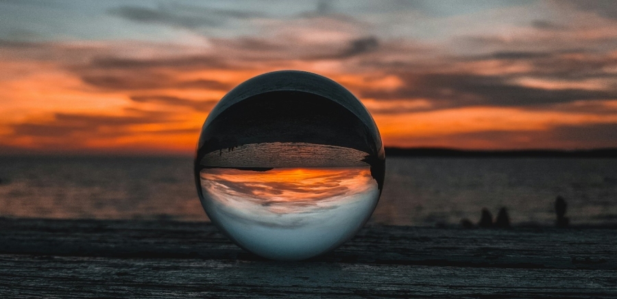 crystal ball against sunset